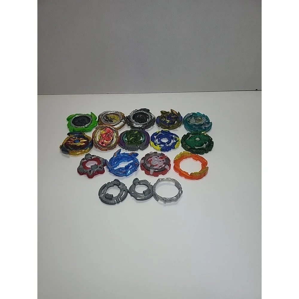 Lot of mixed Beyblade misc parts, bey top pieces and other as‎ seen